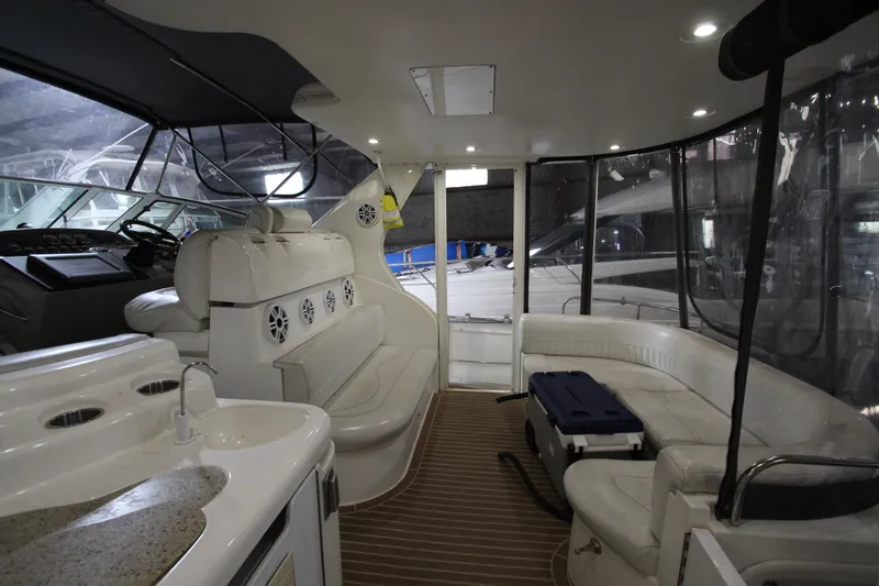 Slide: The Image of Interior of 2003 Cruisers Yachts 4450 Express Motoryacht with luxurious seating and helm. - 24