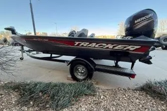 Slide: The Image of 2018 Tracker Pro Team 195 TXW boat with Mercury engine on trailer. - 7