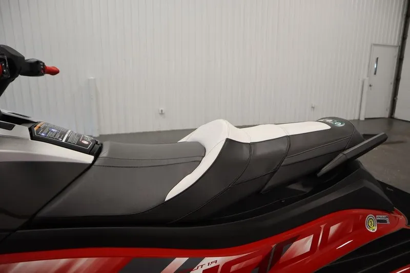 Slide: The Image of 2025 Yamaha WaveRunner GP HO, sleek black and white seat, red accents, indoor setting. - 17
