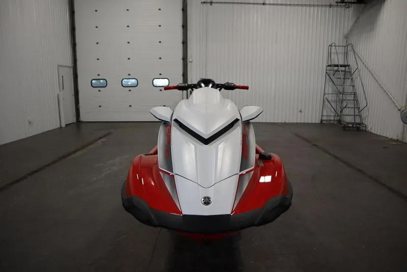 Slide: The Image of 2025 Yamaha WaveRunner GP HO in a garage, front view, red and white design. - 2