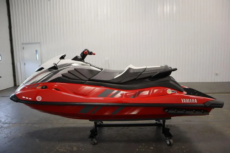 Slide: The Image of 2025 Yamaha WaveRunner GP HO in red, displayed indoors on a stand. - 4