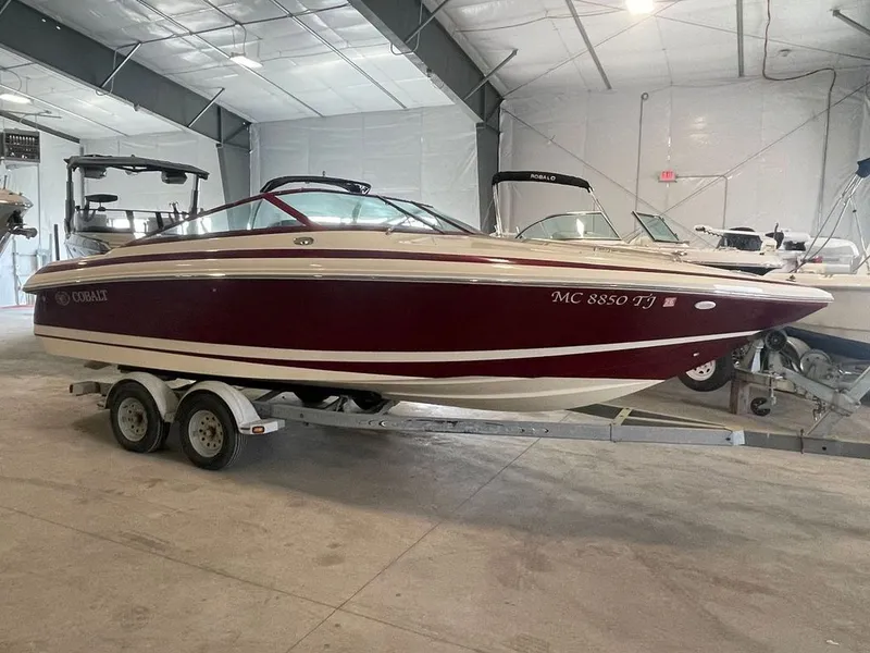 Slide: The Image of 2001 Cobalt 227 boat on trailer in storage facility. - 1