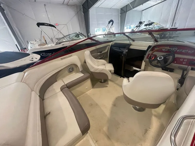 Slide: The Image of Interior of a 2001 Cobalt 227 boat, beige seating. - 12