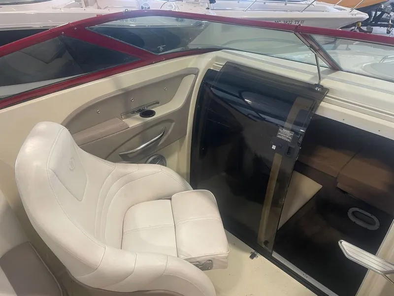 Slide: The Image of Interior of a 2001 Cobalt 227 boat with white seating. - 13