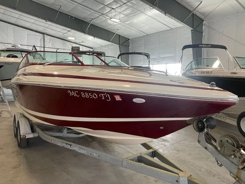 Slide: The Image of 2001 Cobalt 227 boat in storage facility. - 2