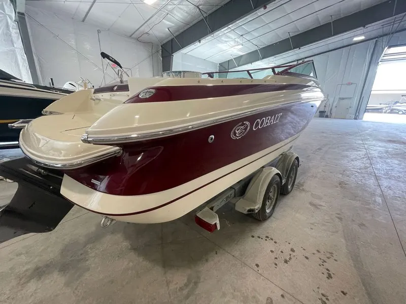 Slide: The Image of 2001 Cobalt 227 boat in a storage facility. - 5