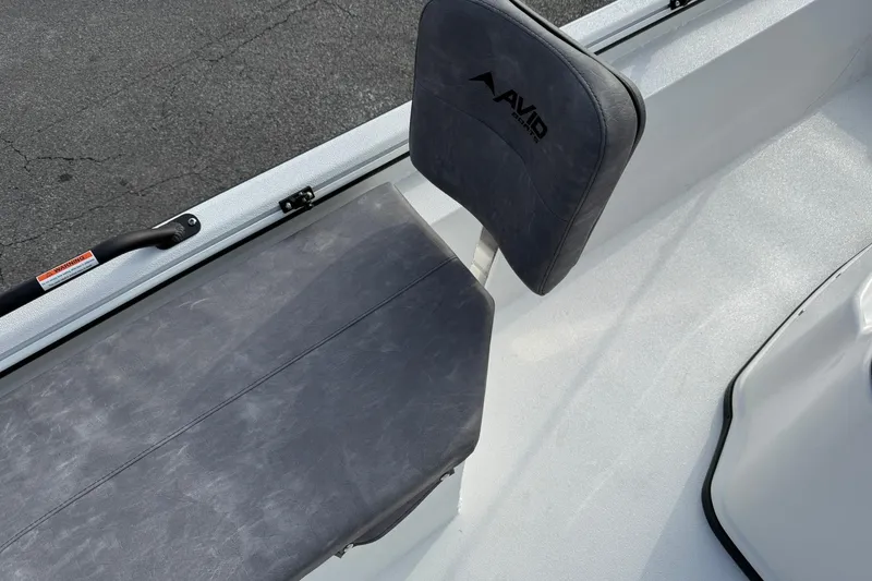 Slide: The Image of Avid 22 Recon 2026 boat seat with logo, featuring sleek gray upholstery. - 23