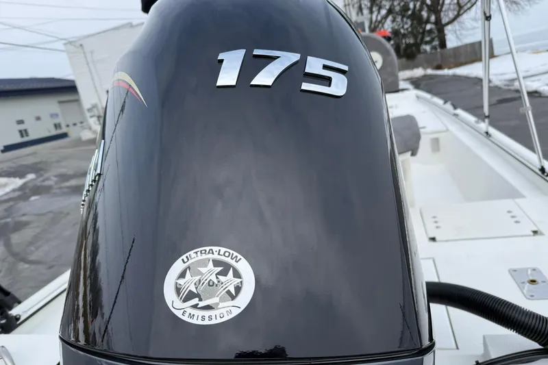 Slide: The Image of Avid 22 Recon 2026 boat engine with 175 horsepower and ultra-low emission sticker. - 5