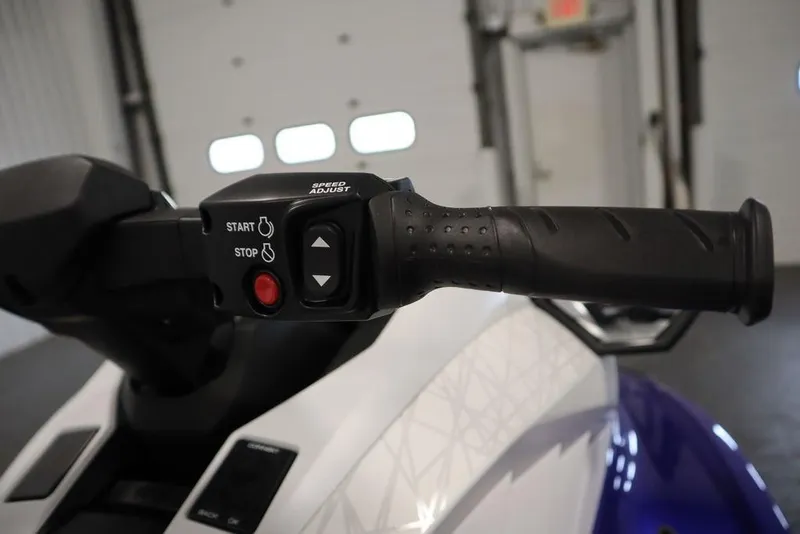 Slide: The Image of 2024 Yamaha WaveRunner GP SVHO handlebar with start, stop, and speed adjust controls. - 13