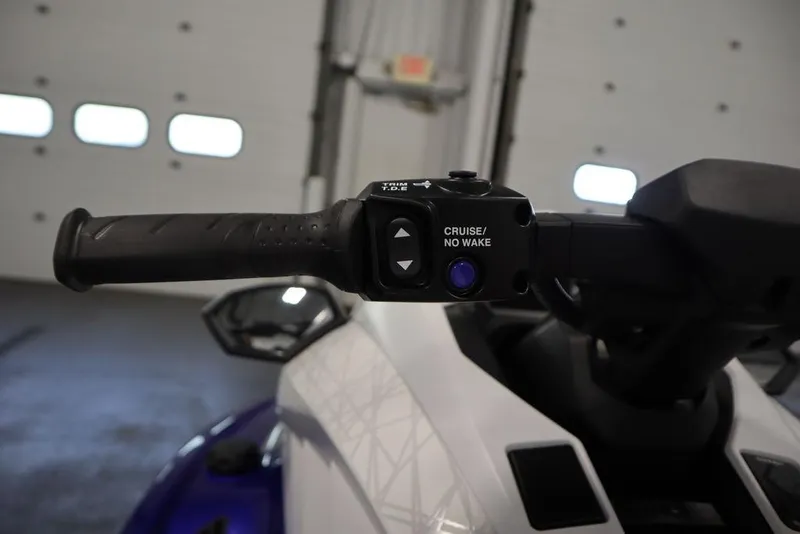 Slide: The Image of Handlebar controls of 2024 Yamaha WaveRunner GP SVHO, featuring cruise and no wake buttons. - 14