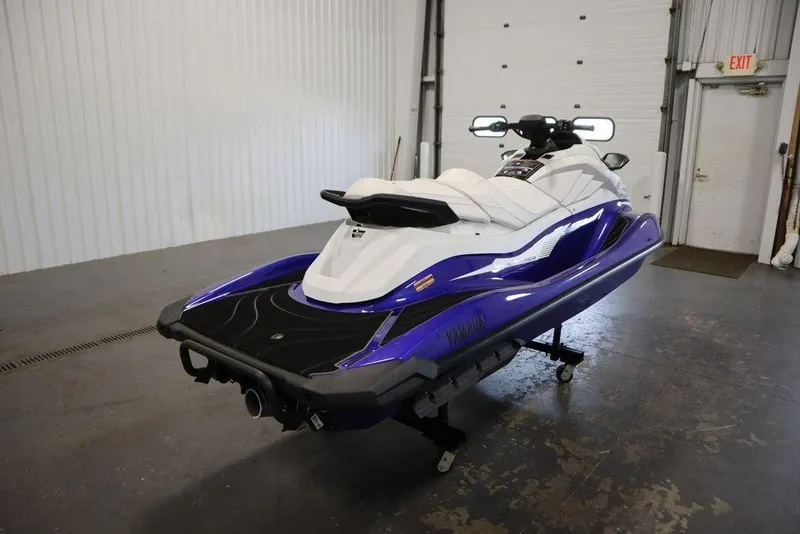 Slide: The Image of 2024 Yamaha WaveRunner GP SVHO in a garage, showcasing sleek design and vibrant colors. - 4