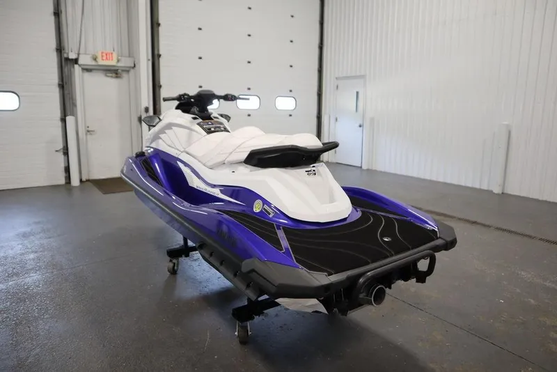 Slide: The Image of 2024 Yamaha WaveRunner GP SVHO in a garage, showcasing sleek design and vibrant colors. - 5