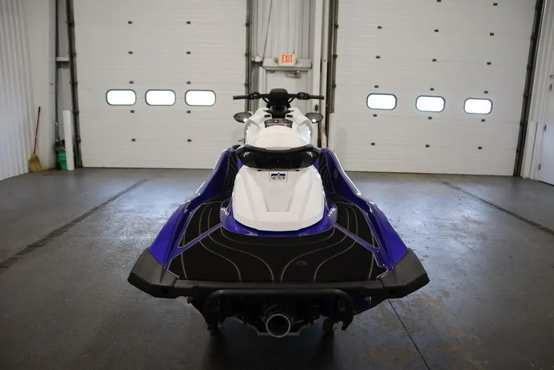 Slide: The Image of 2024 Yamaha WaveRunner GP SVHO in a garage, rear view showcasing sleek design. - 6