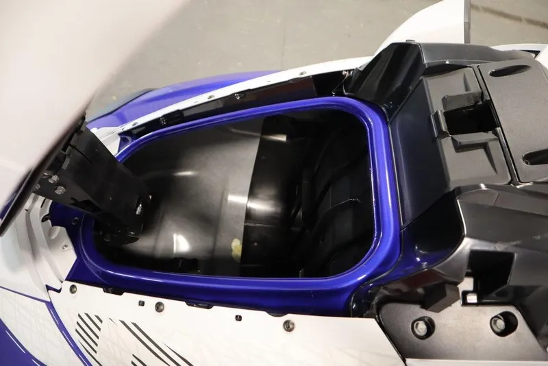 Slide: The Image of 2024 Yamaha WaveRunner GP SVHO storage compartment, open view, showcasing interior space. - 8