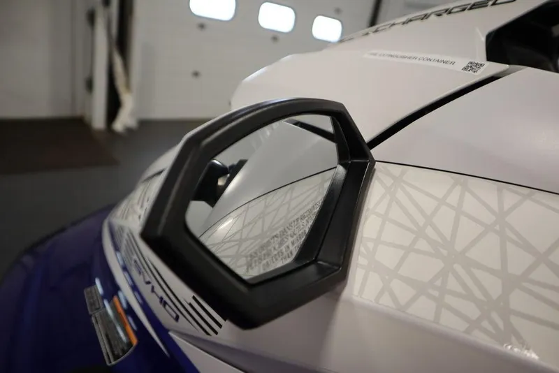 Slide: The Image of 2024 Yamaha WaveRunner GP SVHO close-up, showcasing sleek design and mirror detail. - 7