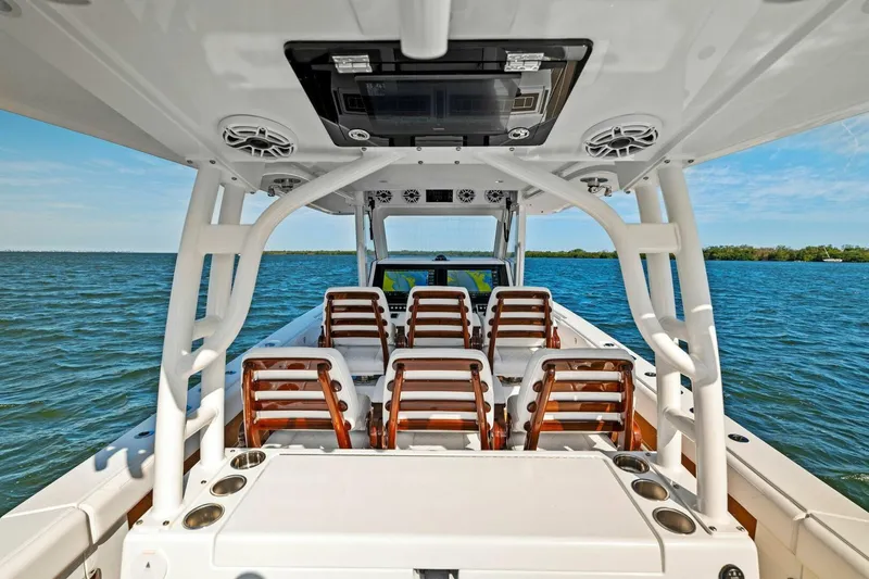 Slide: The Image of 2022 Barker Boatworks 40 HPC interior with seating, on open water. - 10