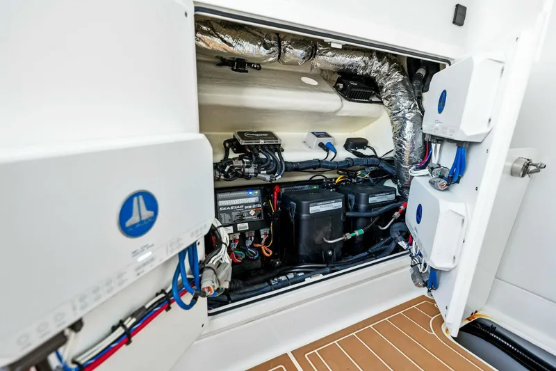 Slide: The Image of 2022 Barker Boatworks 40 HPC engine compartment with advanced wiring and components. - 27