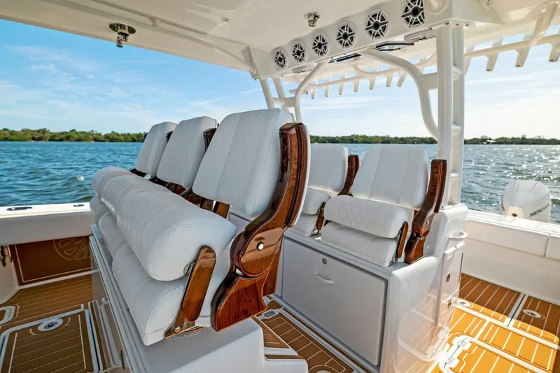 Slide: The Image of Luxury seating on 2022 Barker Boatworks 40 HPC, featuring elegant design and waterfront view. - 3