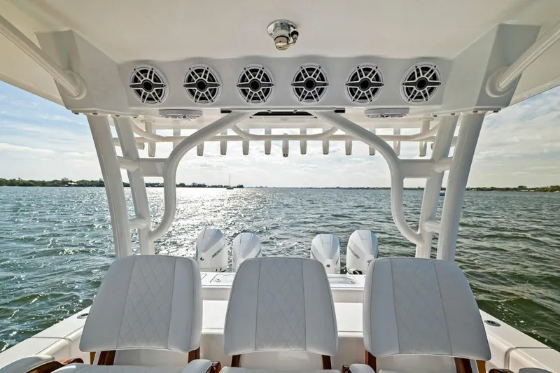 Slide: The Image of 2022 Barker Boatworks 40 HPC interior with seating and ocean view. - 11