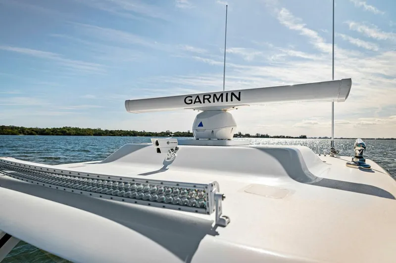 Slide: The Image of 2022 Barker Boatworks 40 HPC with Garmin radar on open water. - 15