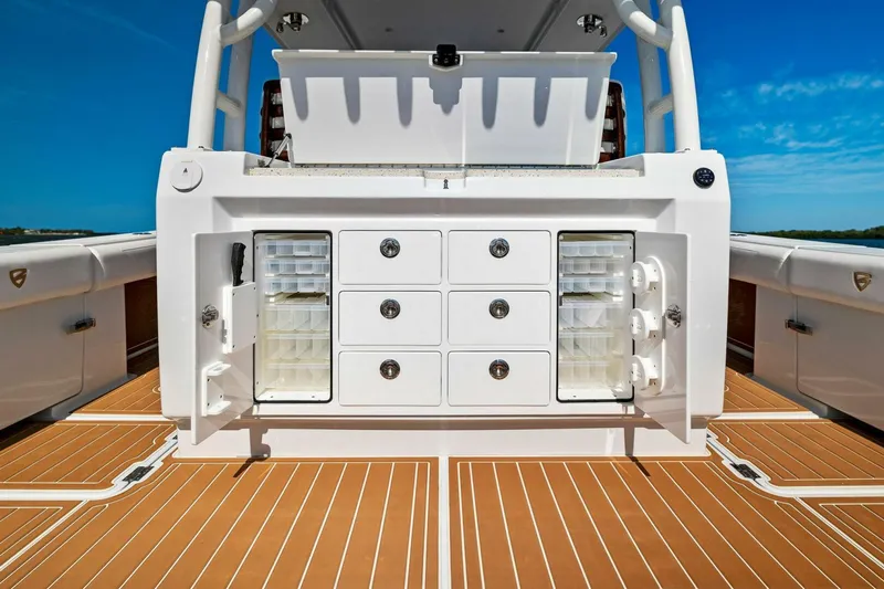 Slide: The Image of Barker Boatworks 40 HPC 2022 model with storage compartments on deck. - 32