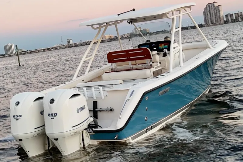 The Image of 2014 Pursuit S 280 Sport boat with twin Yamaha 250 V6 engines on water. - 0
