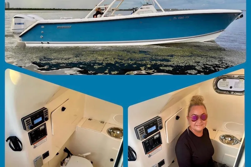 Slide: The Image of 2014 Pursuit S 280 Sport boat on water, interior cabin view with controls and person seated. - 22