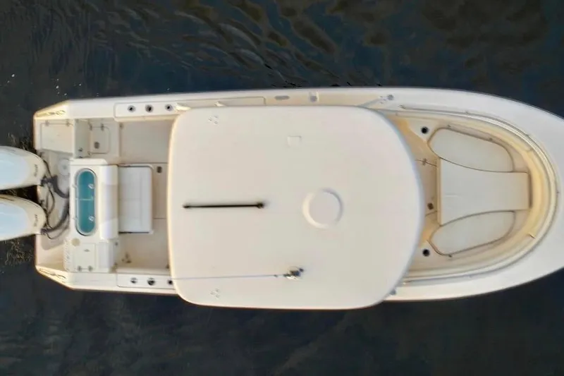 Slide: The Image of Overhead view of 2014 Pursuit S 280 Sport boat on water. - 23