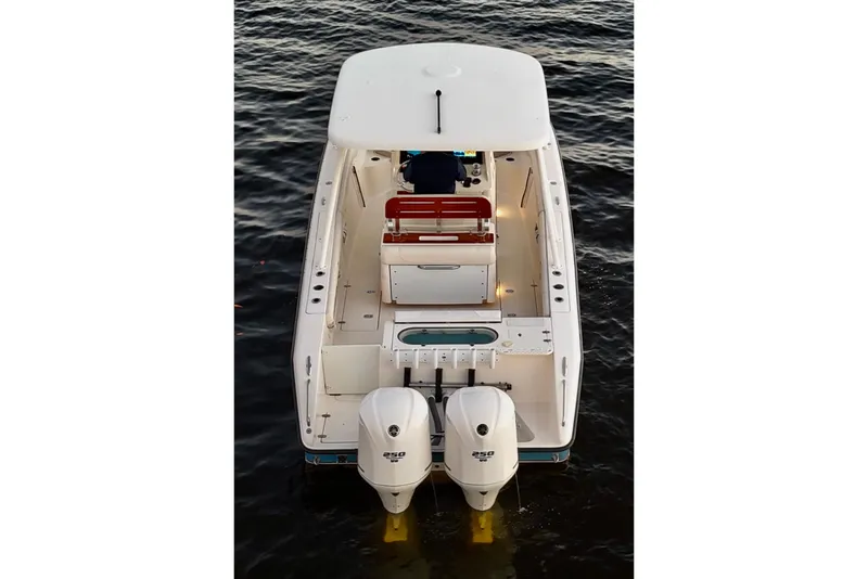 Slide: The Image of 2014 Pursuit S 280 Sport boat with dual engines on water. - 27