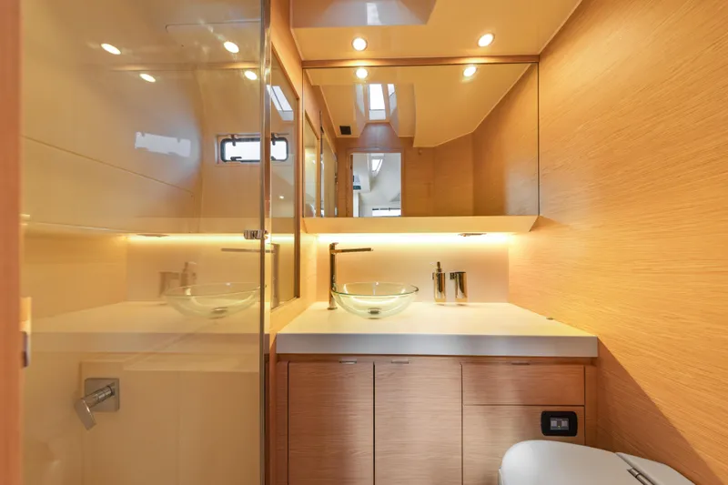 Slide: The Image of Luxurious bathroom interior of 2024 Solaris Power 44 yacht, featuring modern fixtures and elegant design. - 26