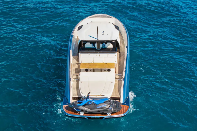 Slide: The Image of 2024 Solaris Power 44 yacht cruising on blue ocean waters, aerial view. - 3