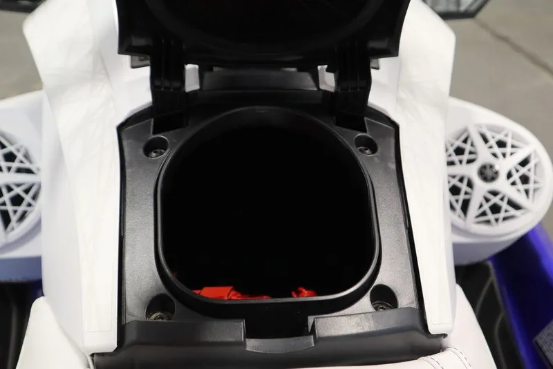 Slide: The Image of 2024 Yamaha WaveRunner GP SVHO storage compartment with open lid and visible speakers. - 16