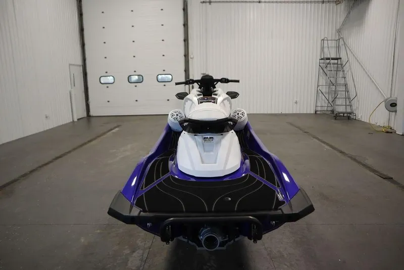 Slide: The Image of 2024 Yamaha WaveRunner GP SVHO in a spacious indoor setting, rear view. - 3