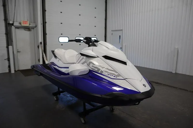 Slide: The Image of 2024 Yamaha WaveRunner GP SVHO in a showroom, featuring sleek white and blue design. - 7