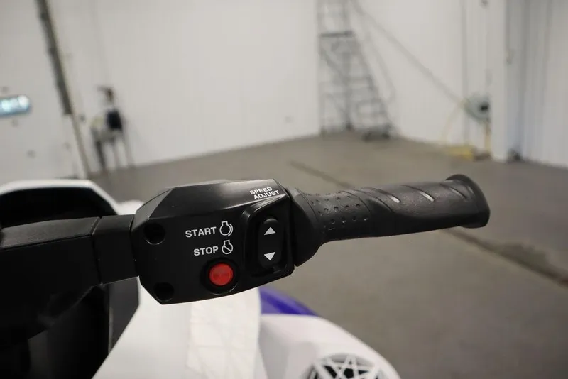 Slide: The Image of 2024 Yamaha WaveRunner GP SVHO handlebar with start and stop controls. - 12
