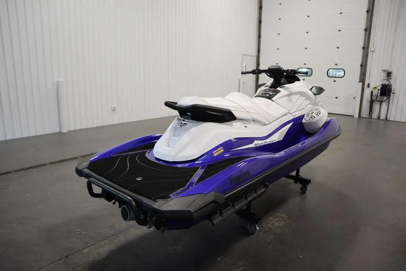 Slide: The Image of 2024 Yamaha WaveRunner GP SVHO in a showroom, showcasing sleek design and vibrant colors. - 5