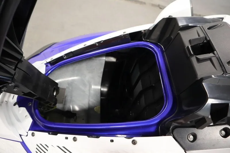 Slide: The Image of 2024 Yamaha WaveRunner GP SVHO storage compartment, open view, showcasing interior details. - 9