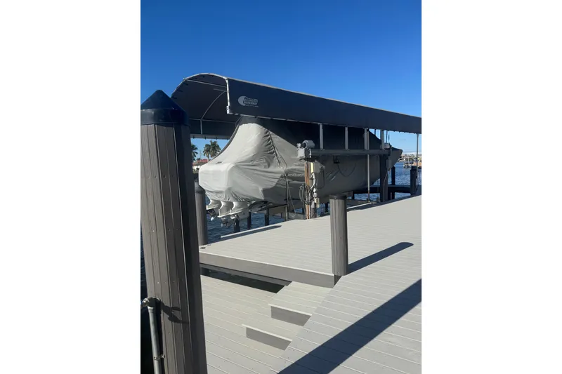 Slide: The Image of 2021 Sportsman Open 352 Center Console boat interior with seating and storage. - 25