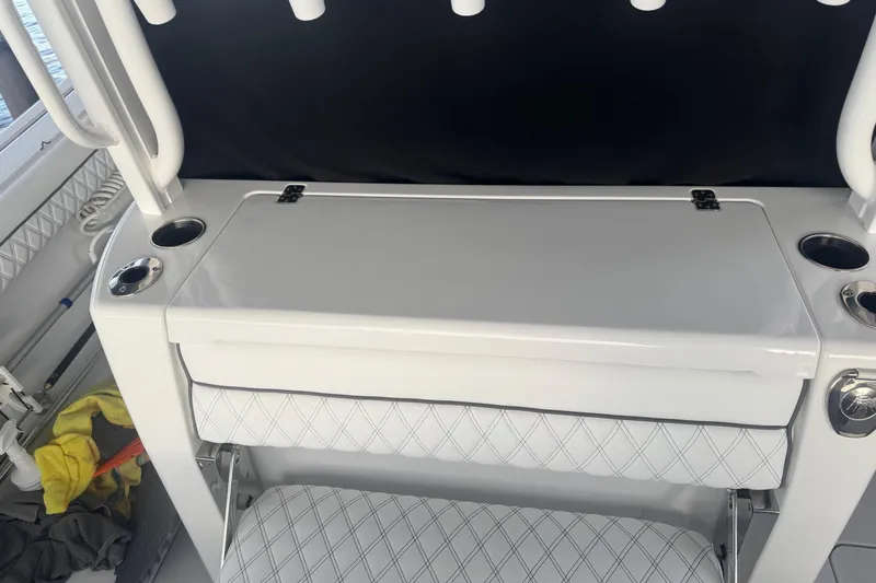 Slide: The Image of 2021 Sportsman Open 352 Center Console charging station with dual wireless pads and USB cable. - 33
