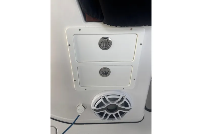 Slide: The Image of 2021 Sportsman Open 352 Center Console interior with seating and storage compartments. - 34