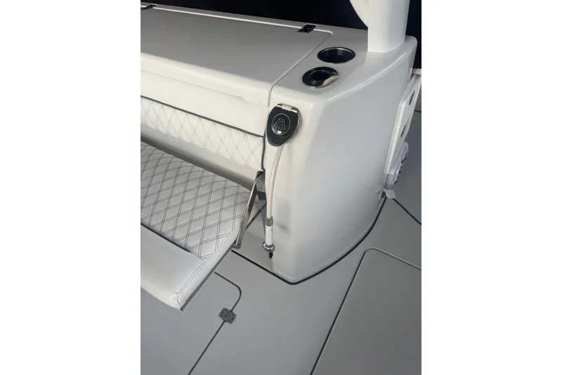 Slide: The Image of 2021 Sportsman Open 352 Center Console storage compartments and speaker detail. - 35