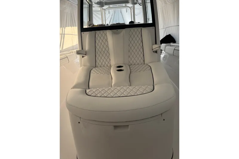 Slide: The Image of Luxurious seating on 2021 Sportsman Open 352 Center Console boat interior. - 9
