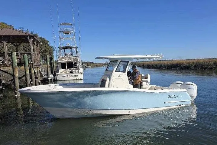 The Image of Manufacturer Provided Image: 2026 Pioneer 250 Pelagic boat on calm water, featuring sleek design and modern amenities. - 0