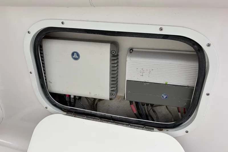 Slide: The Image of Electrical components inside a 2020 Glasstream 360 SCX boat compartment. - 13