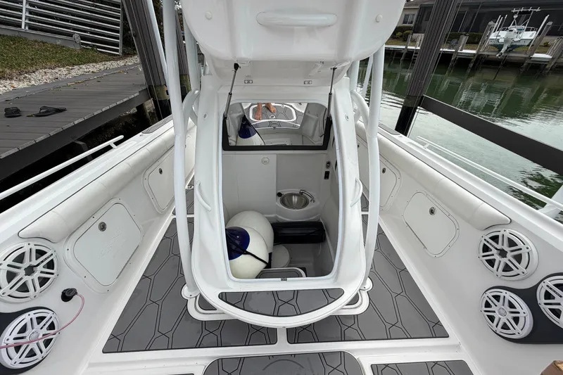Slide: The Image of 2020 Glasstream 360 SCX boat interior with seating, speakers, and storage compartments. - 5