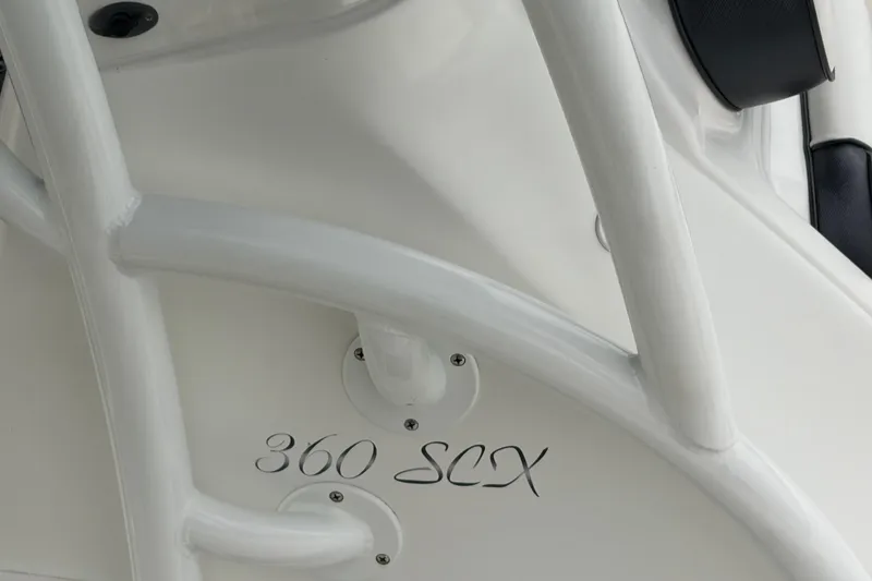 Slide: The Image of 2020 Glasstream 360 SCX boat detail with white railing and model name. - 7