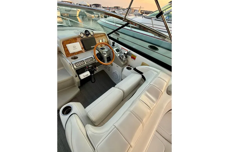Slide: The Image of 2008 Formula 350 Sun Sport boat cockpit with leather seating and modern controls. - 10