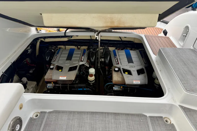 Slide: The Image of Engine compartment of a 2008 Formula 350 Sun Sport boat, featuring twin MerCruiser engines. - 23