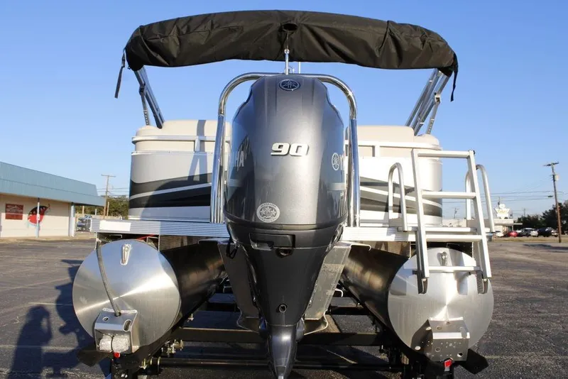 Slide: The Image of 2026 Avalon VLS QUAD LOUNGER 21 pontoon boat with Yamaha 90 engine, rear view. - 10