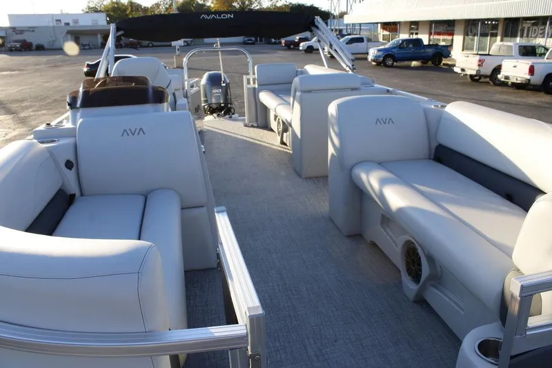 Slide: The Image of 2026 Avalon VLS QUAD LOUNGER 21 pontoon boat interior with plush seating and modern design. - 14